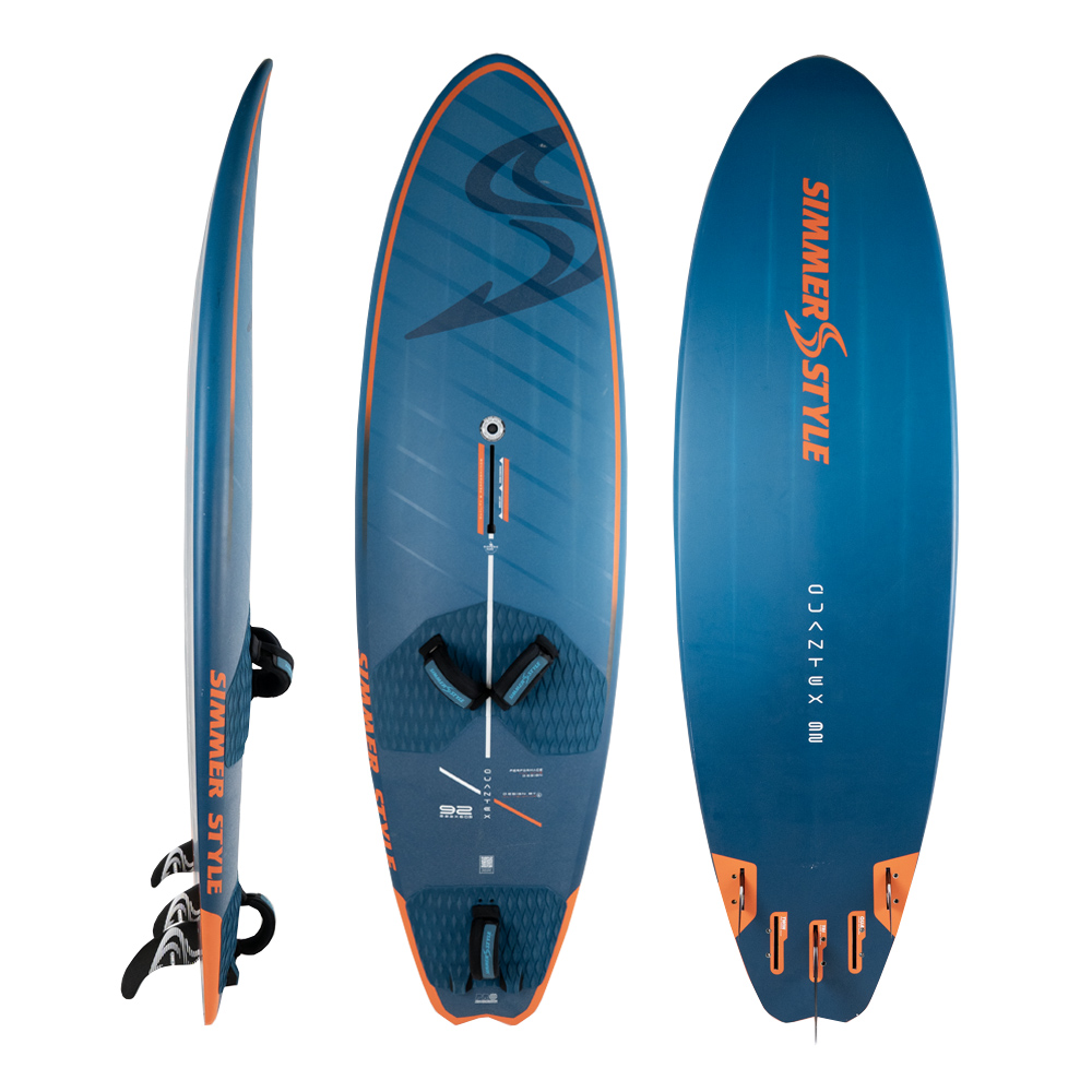 Windsurf board shown from side and three-quarter views in blue and orange with foot straps and fins attached at the tail side view highlight orange accents and branding.